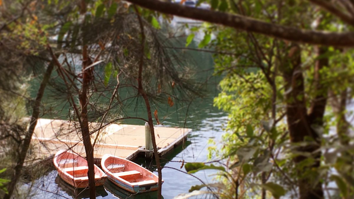Two canoes moored on the river. Photo: Adventure Hat Blog