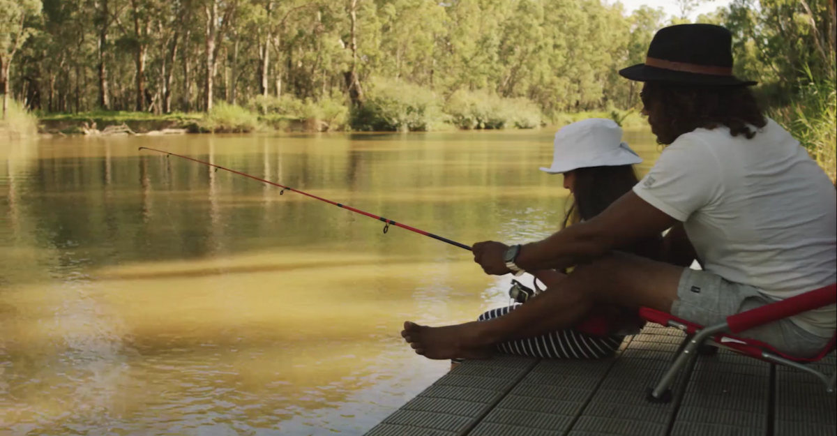 People fishing on the Murray River Swifts Creek campground. Photo credit: Boen Ferguson / DPE