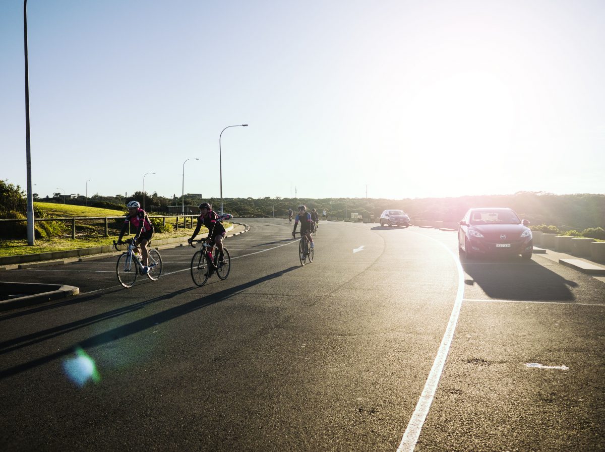 People cycling the La Perouse Loop road in the sunshine. Photo: Nick Alfred