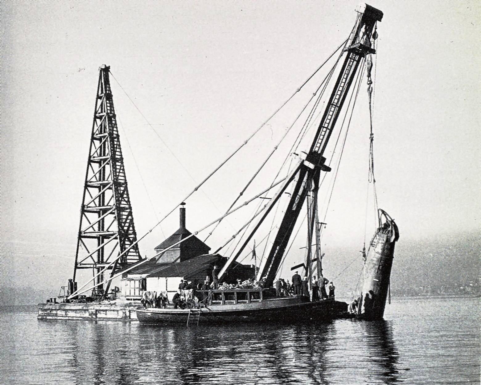 An historical image of a Japanese midget submarine M-22 being raised from Taylor's Bay, Sydney, 1942