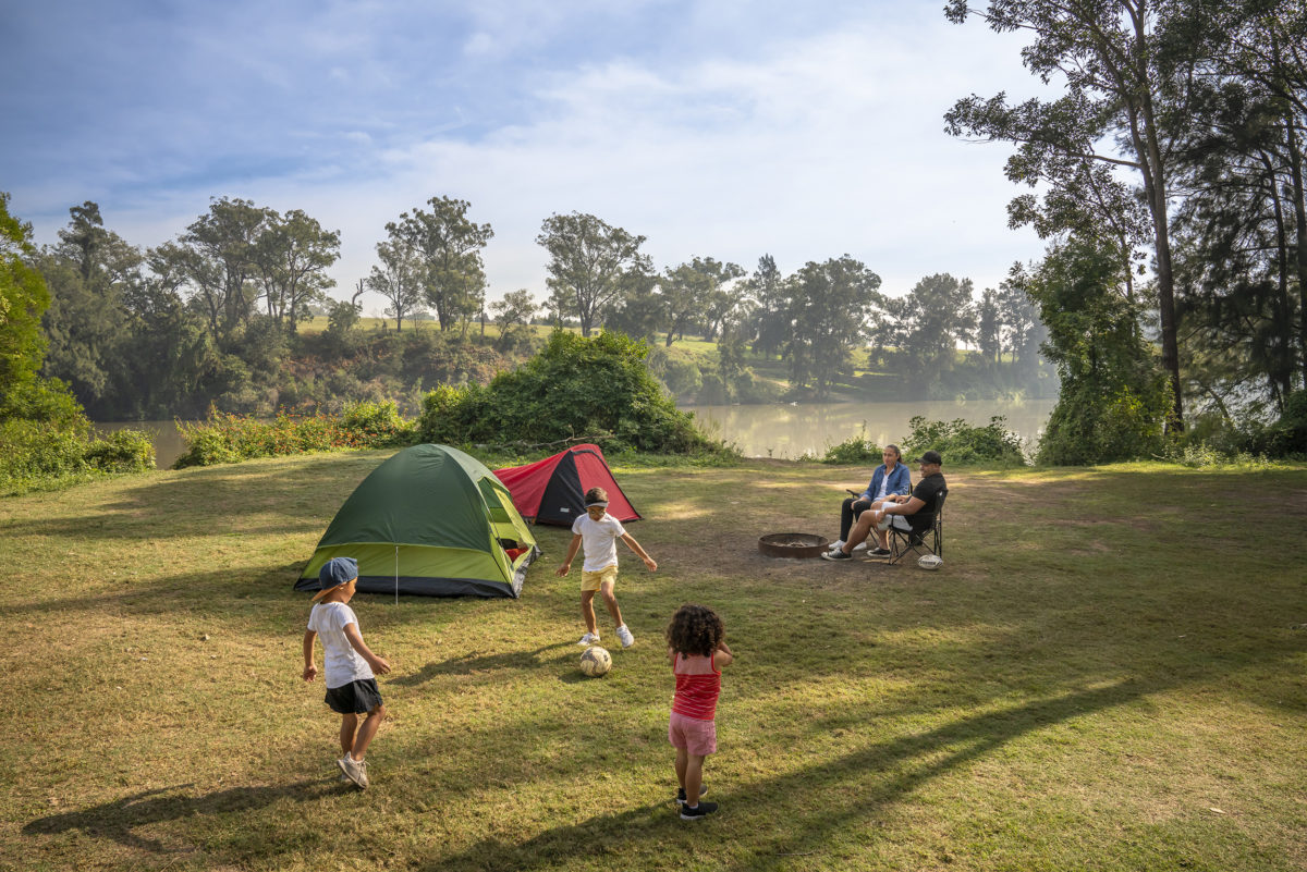 A family in Cattai campground, Cattai National Park. Photo: John Spencer / DPE