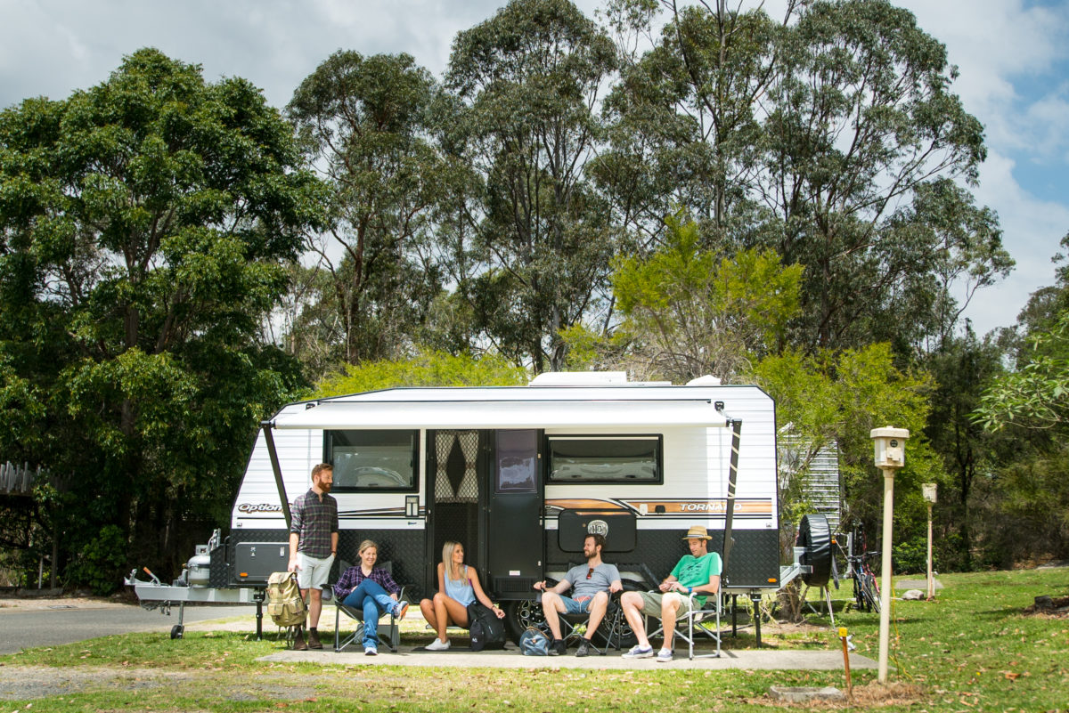 A group of people outside their camper in Lane Cove National Park. Photo: Daniel Parsons