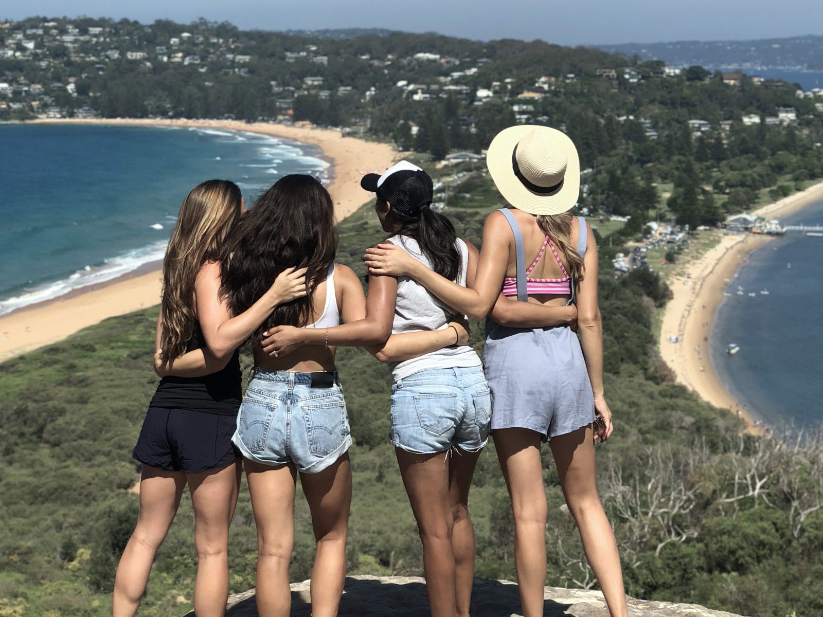 Group of people looking at towards Palm Beach from Barrenjoey Lighthouse. Photo: Jamie Kennedy