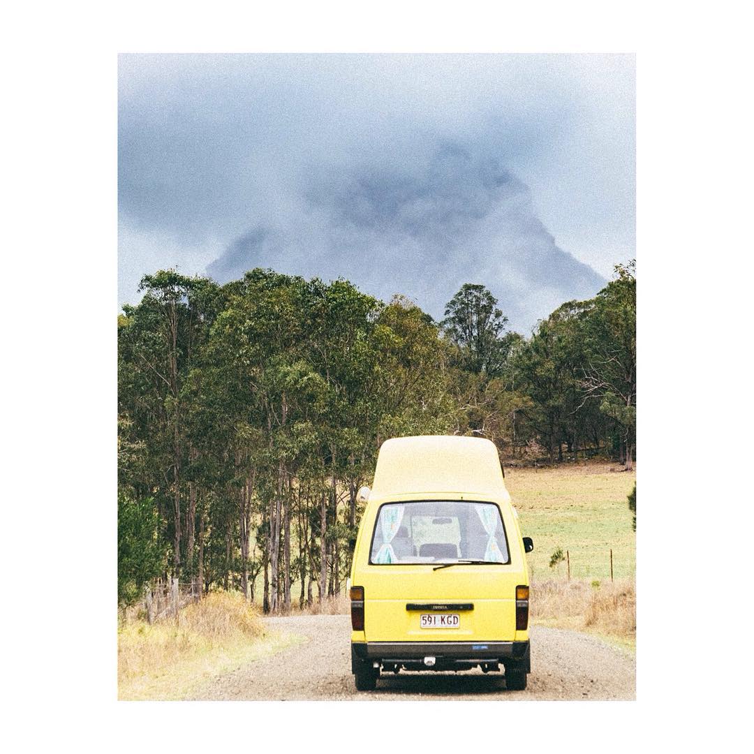 Campervan driving along an unsealed road. Photo: Instagram @bumblearound