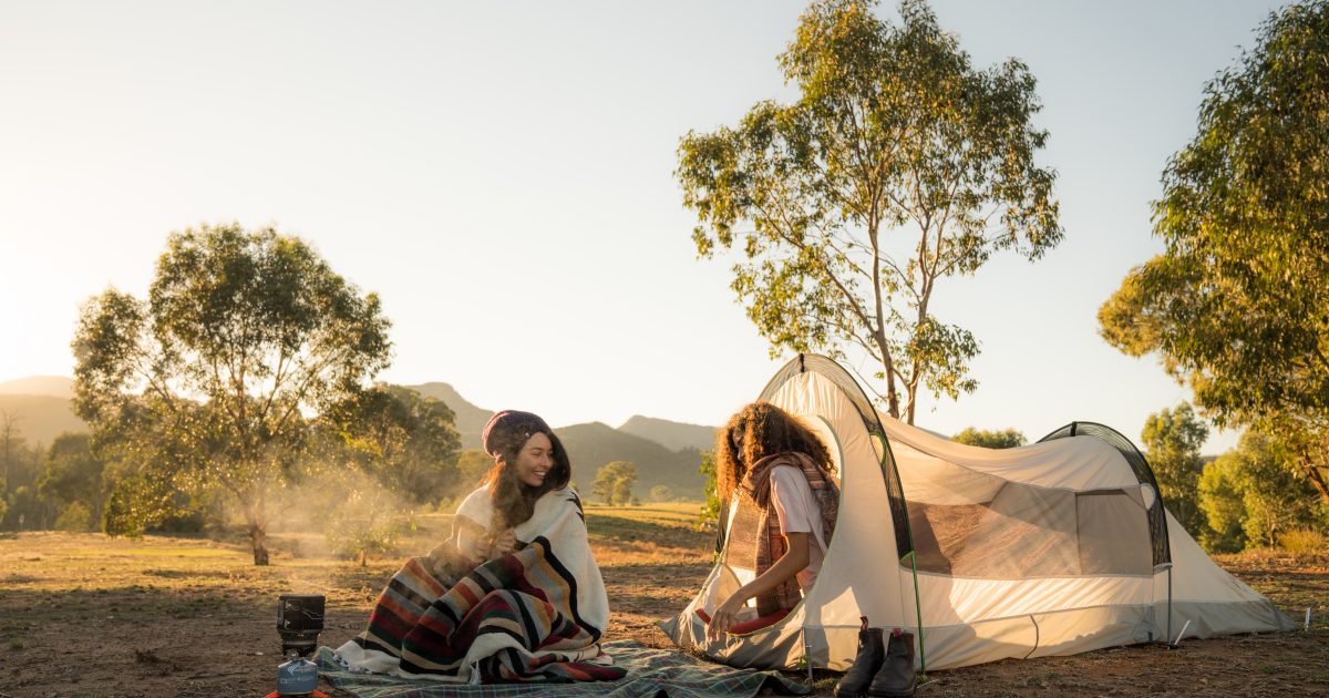 Two people at Camp Blackman in Warrumbungle National Park. Photo: Rob Mulally/DPIE