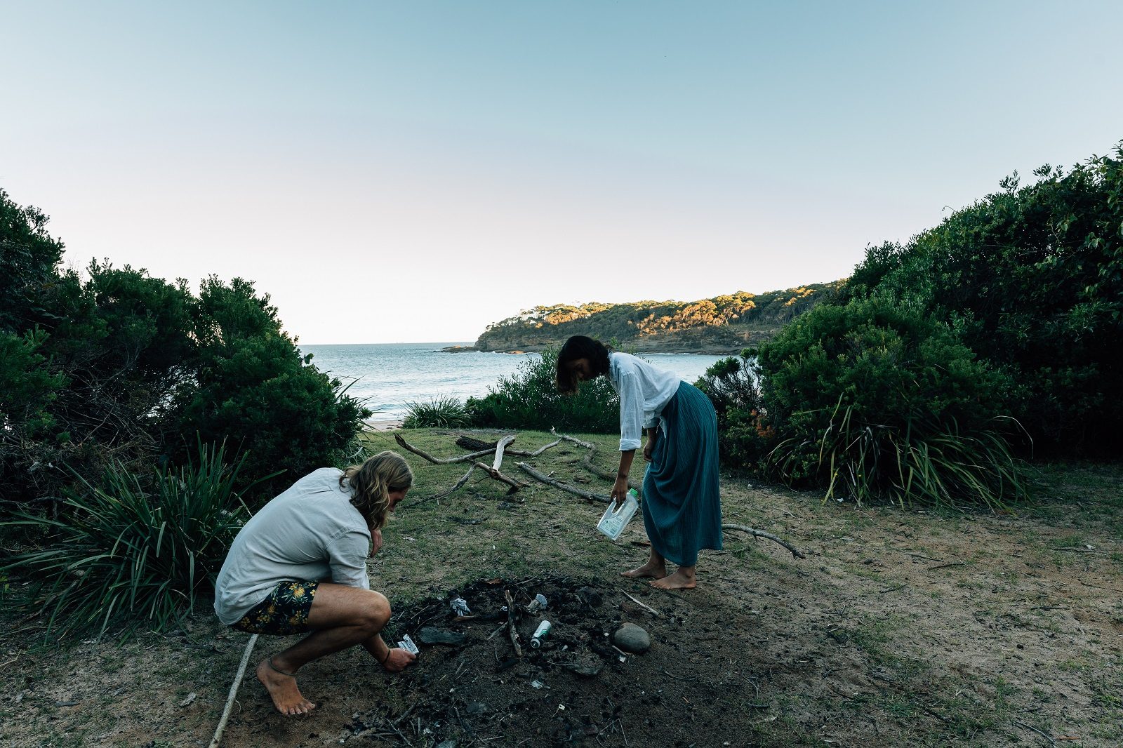 People cleaning up rubbish at Emily Miller Beach in Murramarang National Park. Photo credit: Melissa Findley/DPIE