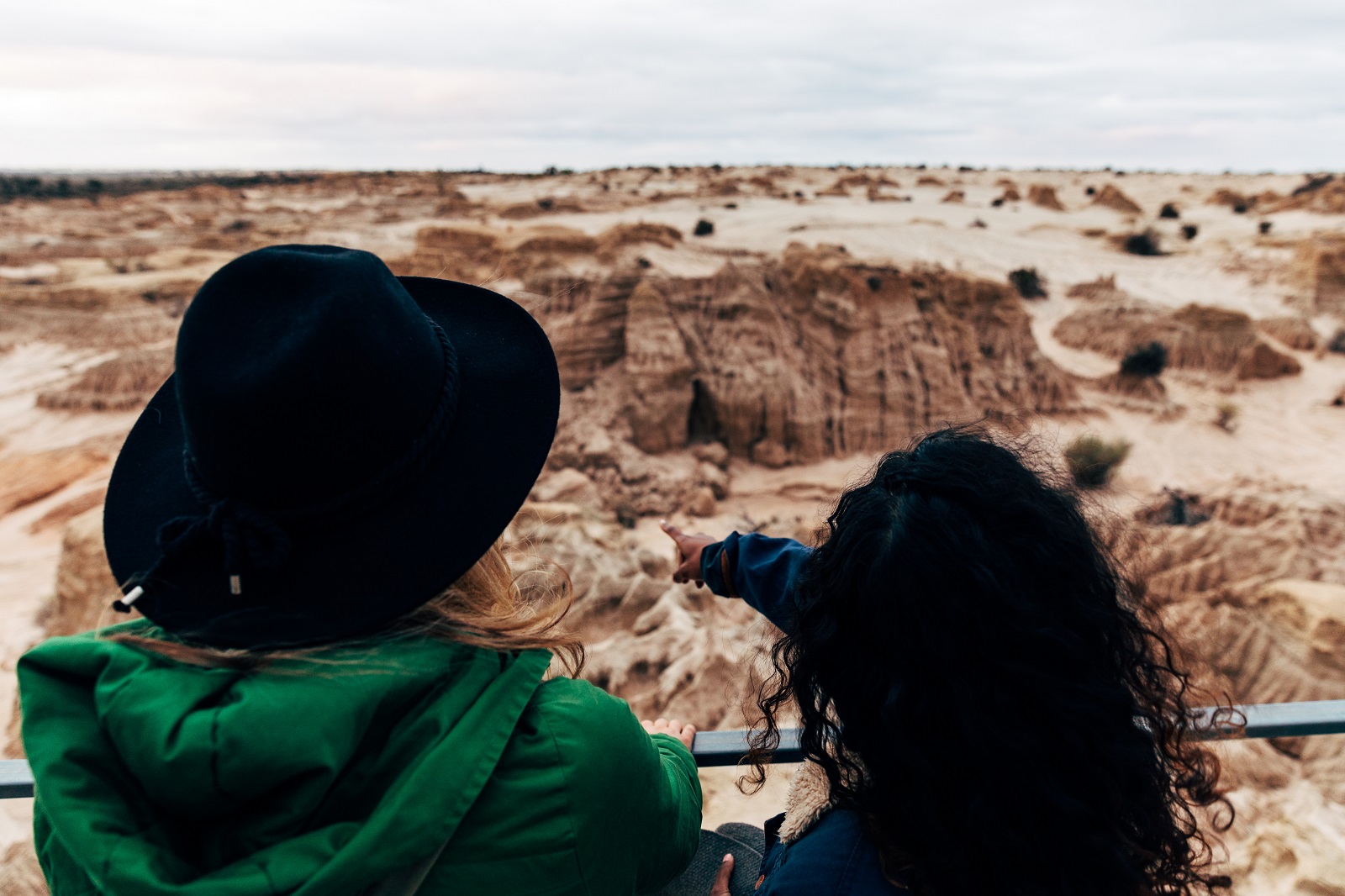 Looking at lunettes which are thick layers of sand and clay at Red Top lookout in Mungo National Park. Photo: Melissa Findley/DPIE