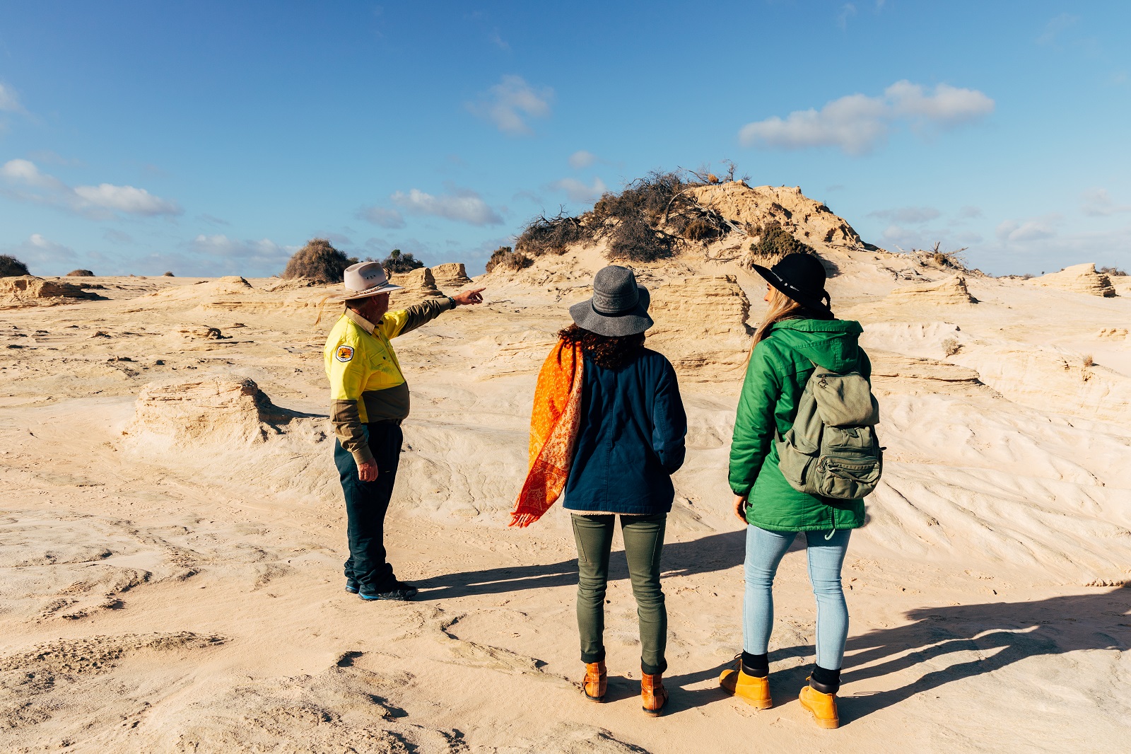 Group visiting Walls of China on a NPWS guided tour in Mungo National Park. Photo: Melissa Findley/DPIE