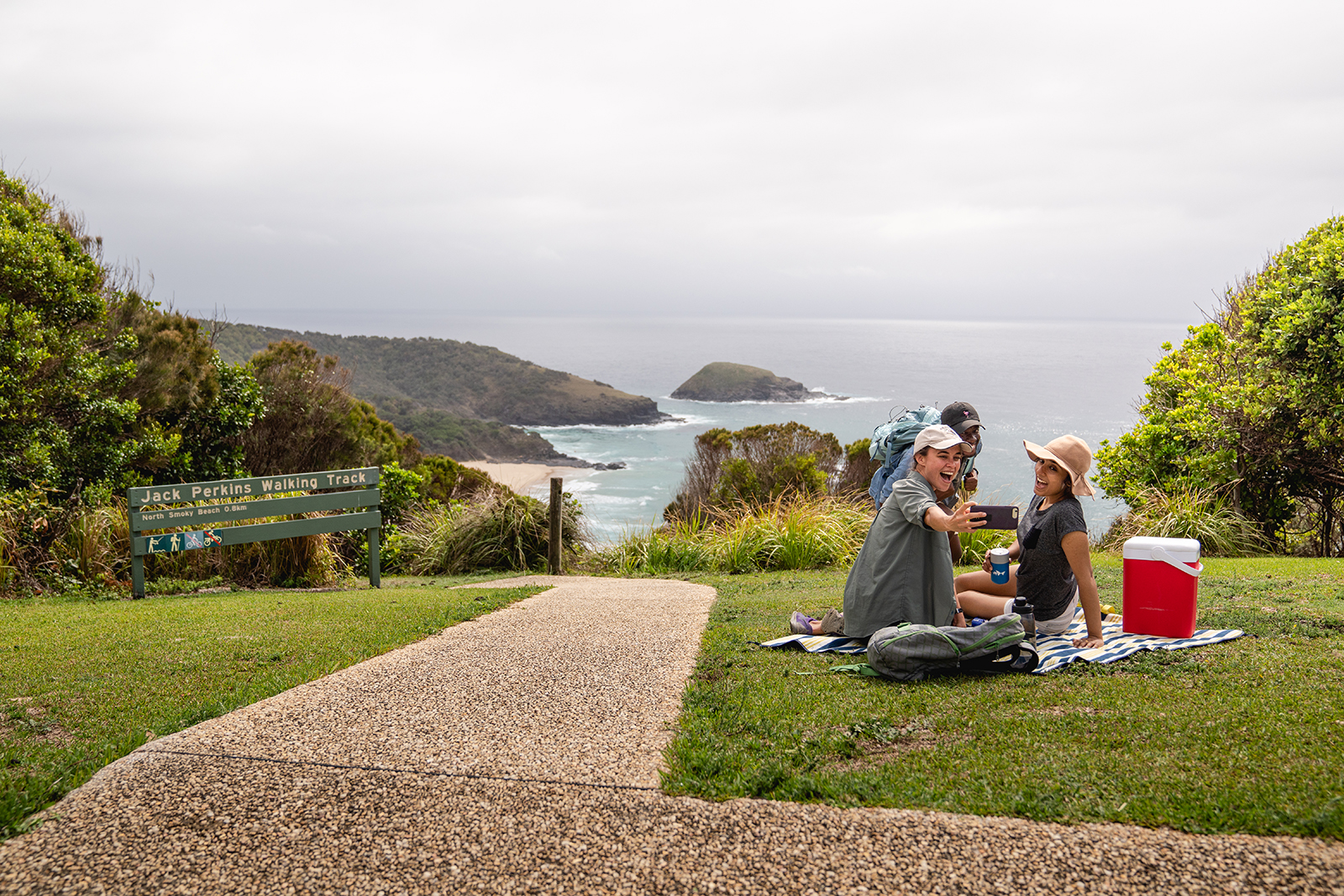 Group of people having a picnic near Jack Perkins walking track, Hat Head National Park. Photo: Rob Mulally/DPIE