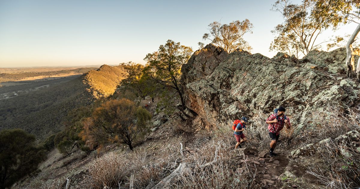 Two people hiking along the Yerong walking track, The Rock Nature Reserve - Kengal Aboriginal Place. Photo credit: Rob Mulally/DPIE