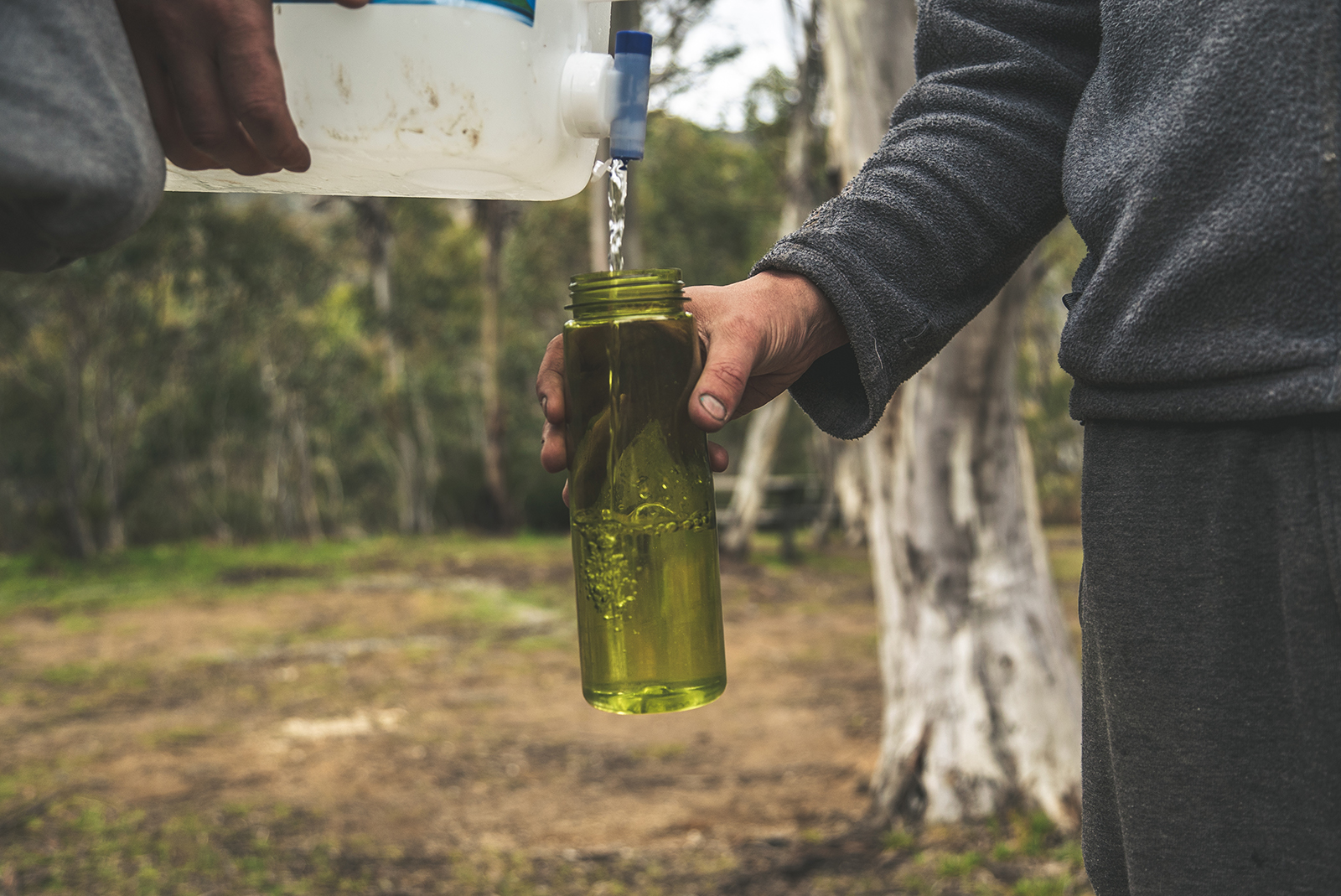 A person filling up their drink bottle with water. Photo: Daniel Parsons/DPIE
