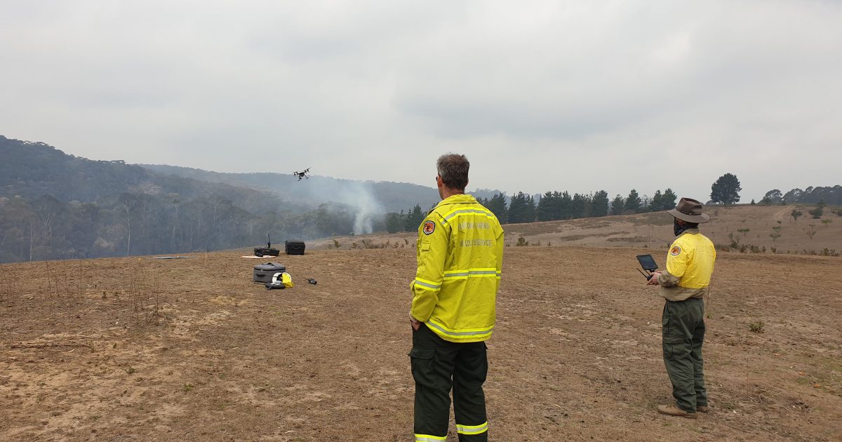 Drone pilots working in pairs. Launch and land drones from the fireground. Photo credit: Scott Colefax / DPIE
