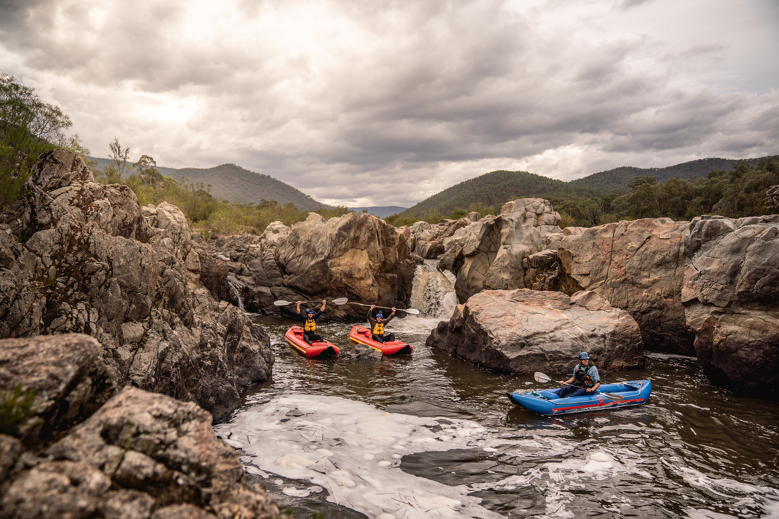 Three people in kayaks on the snowy river., on a guided kayaking tour. Photo credit : Rob Mulally / DPE