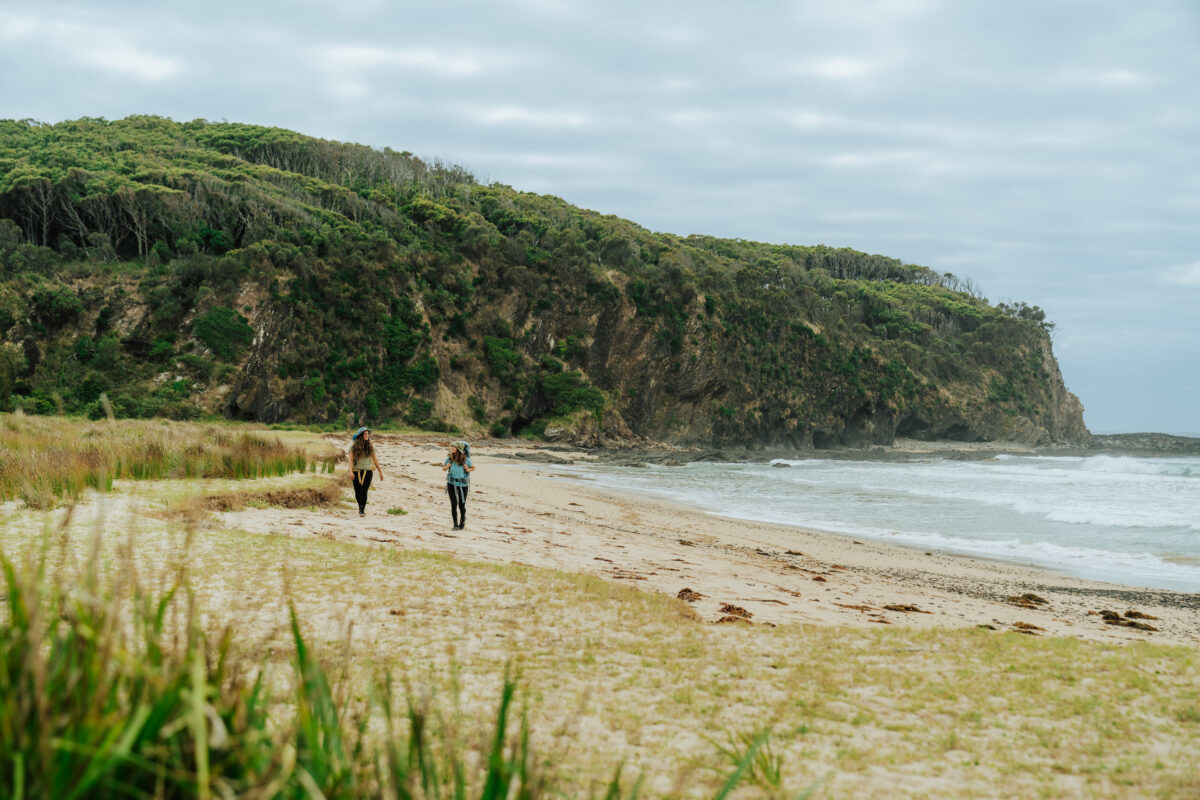 People walking along Oaky Beach. Photo credit: Remy Brand © Remy Brand / DPE