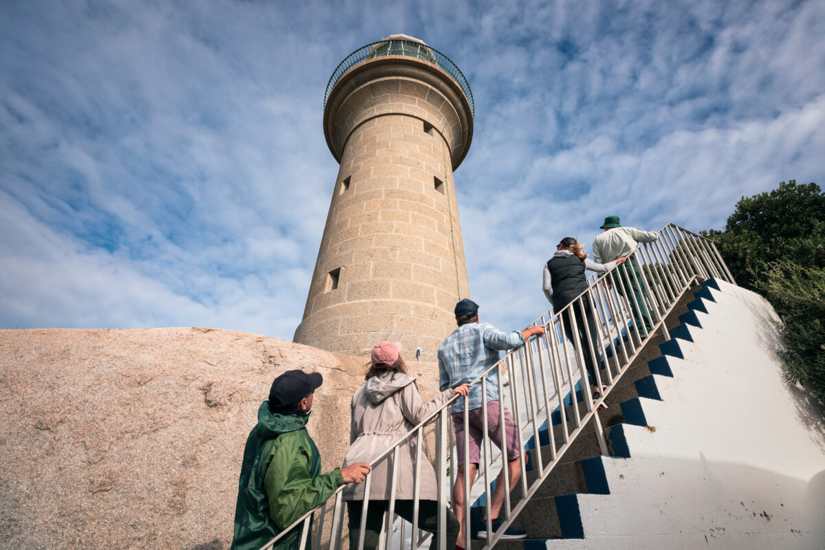 People walking up stairs - Montague Island Lighthouse. Photo credit: Daniel Tran / DPE