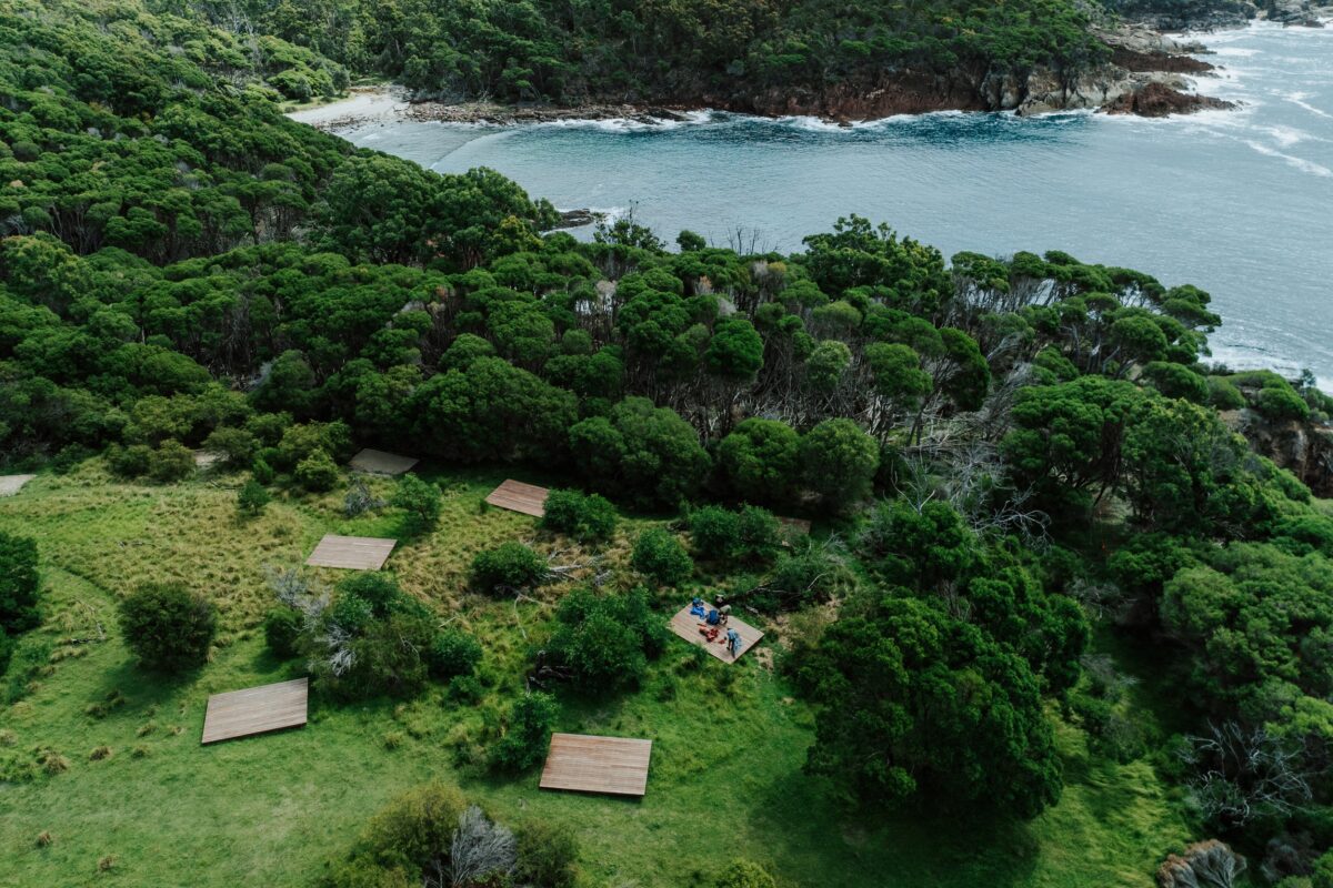 An aerial veiw of the camping platforms at Mowarry Campground on the Light to Light Walk. Photo credit: Daniel Parsons/DCCEEW